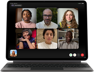 iPad Air, attached to Magic Keyboard, Black colour, Group FaceTime call on screen