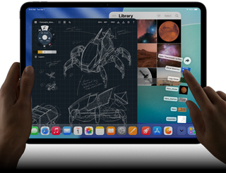 iPad Pro, space black colour, left hand holding device, right hand pointing gesturing to manipulate multiple open app windows, a drawing app with sketches of mechanical designs, photos library of planets and space images, downloads folder files fanned out