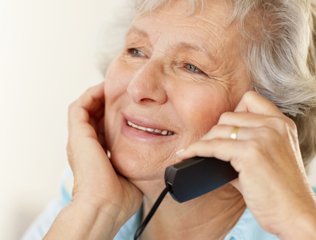 a lady using the phone