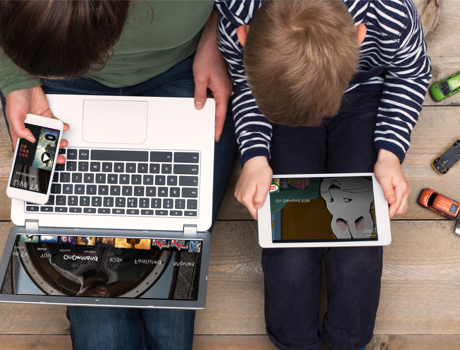 people watching TV on a smartphone, laptop, and tablet