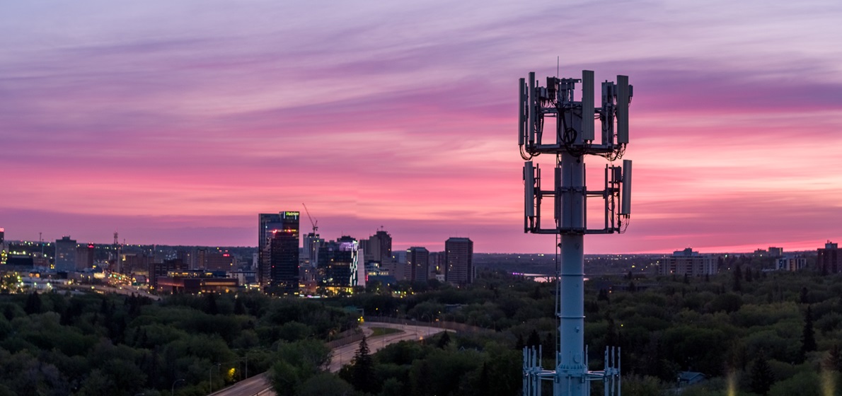 Saskatoon city sunrise with wireless tower in forefront