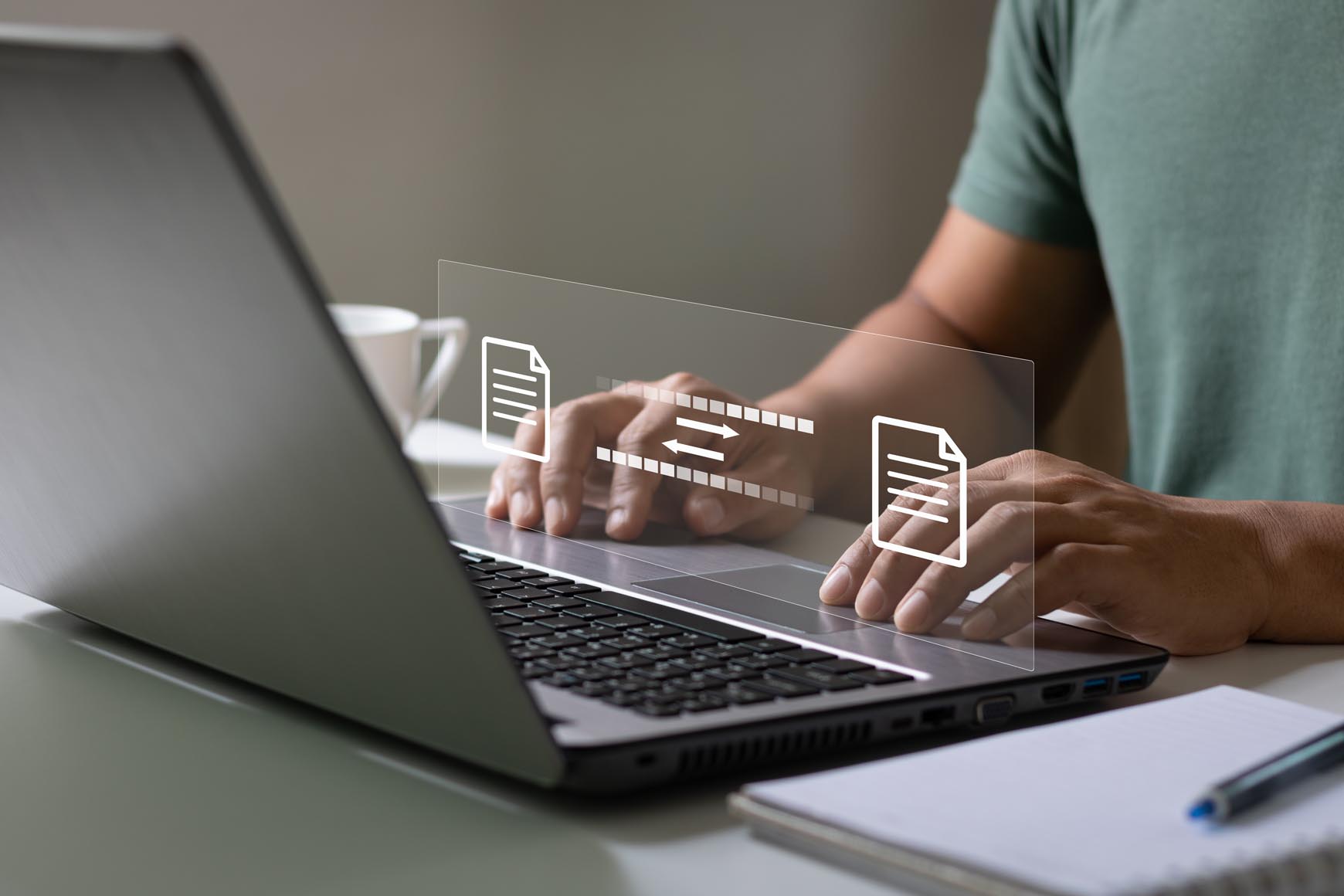 man on computer witch icon depicting file backup or transfer