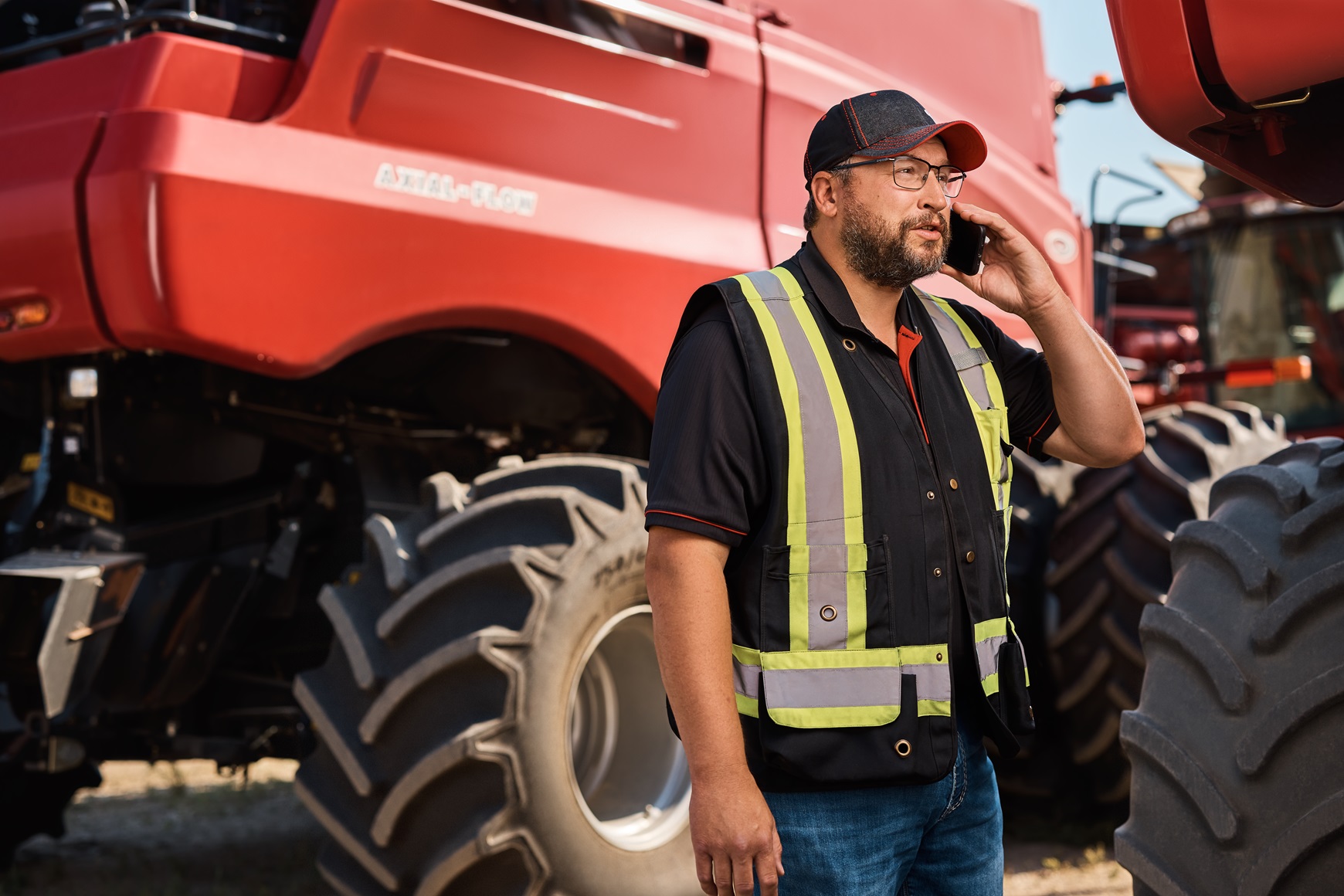 Ag worker talking on cellphone