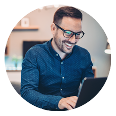Man working on a laptop at home