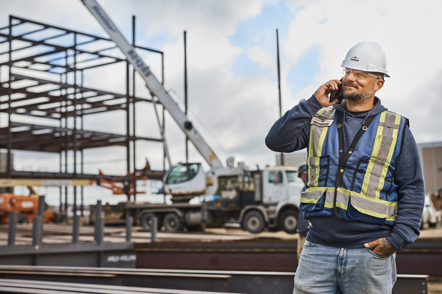 Workers in a field working on computer